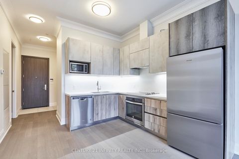 Photo 1 at 115 - 25 Water Walk Drive, Unionville, Markham