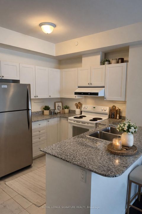 Photo 1 at 211 - 70 Shipway Avenue, Newcastle, Clarington