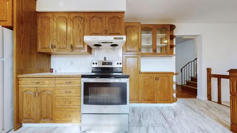 Photo 10 at 15 Thistlewaite Crescent, Malvern West, Toronto