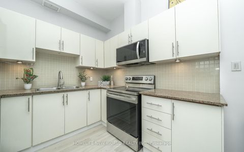 Photo 8 at 303 - 1 St Johns Road, Junction Area, Toronto