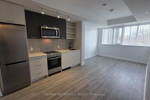 Photo 2 at 307 - 2300 St Clair Avenue W, Junction Area, Toronto