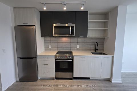 Photo 5 at 307 - 2300 St Clair Avenue W, Junction Area, Toronto