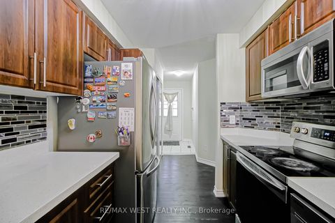 Photo 4 at 12 - 6400 Lawrence Avenue E, Rouge E10, Toronto
