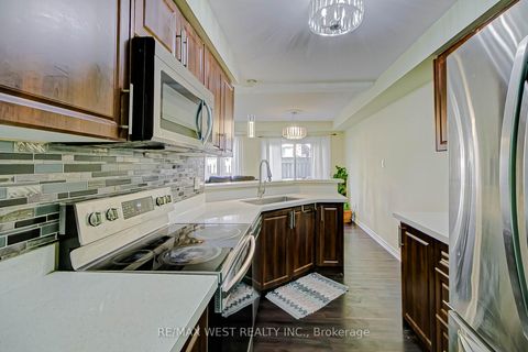 Photo 7 at 12 - 6400 Lawrence Avenue E, Rouge E10, Toronto