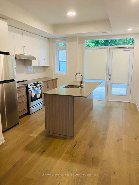 Photo 1 at 102 - 110 Canon Jackson Drive, Amesbury, Toronto