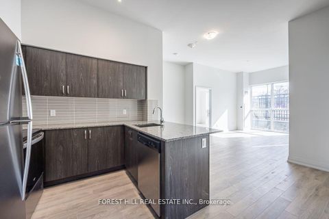 Photo 2 at 105 - 10 Meadowglen Place, Woburn, Toronto