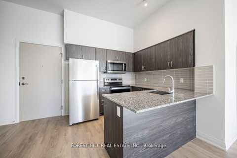 Photo 4 at 105 - 10 Meadowglen Place, Woburn, Toronto