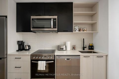 Photo 4 at 407 - 2300 St Clair Avenue W, Junction Area, Toronto