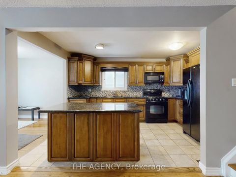 Photo 7 at 54 Manorglen Crescent, Malvern West, Toronto