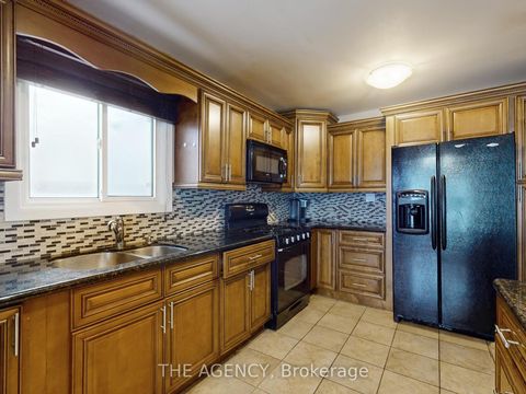 Photo 8 at 54 Manorglen Crescent, Malvern West, Toronto