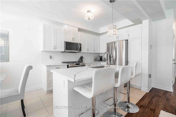 Photo 14 at 12 - 90 RAYMOND Road N, Meadowlands, Hamilton