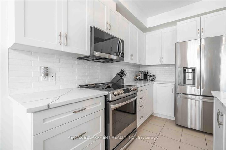 Photo 18 at 12 - 90 RAYMOND Road N, Meadowlands, Hamilton