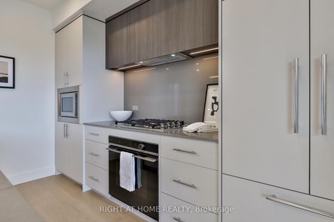 Photo 3 at Centre - 2343 Gerrard Street E, Danforth, Toronto