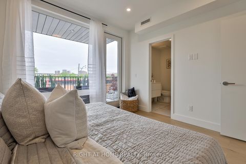 Photo 12 at Centre - 2343 Gerrard Street E, Danforth, Toronto