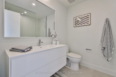 Photo 13 at Centre - 2343 Gerrard Street E, Danforth, Toronto