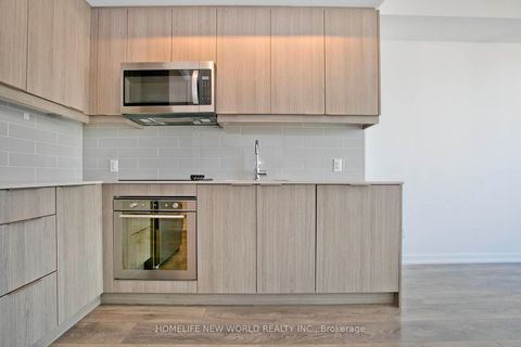 Photo 5 at 2004 - 32 Forest Manor Road, Henry Farm, Toronto