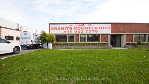 Photo 1 at 01 - 63 Torbarrie Road, CFB, Toronto