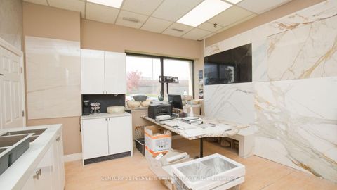 Photo 2 at 01 - 63 Torbarrie Road, CFB, Toronto