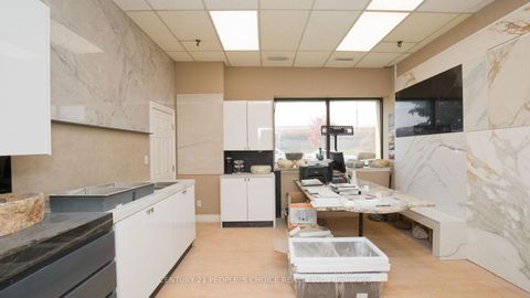 Photo 3 at 01 - 63 Torbarrie Road, CFB, Toronto