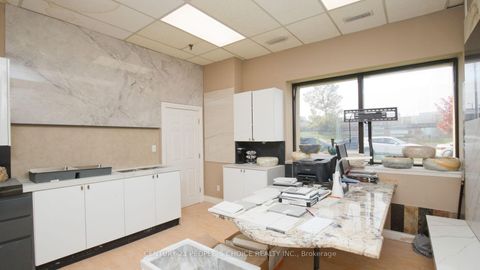 Photo 4 at 01 - 63 Torbarrie Road, CFB, Toronto