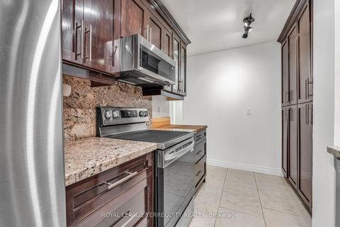 Photo 12 at 410 - 812 Burnhamthorpe Road, Markland Wood, Toronto