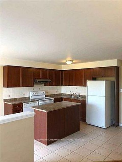 Photo 5 at 139 Raponi Circle, Rouge E11, Toronto