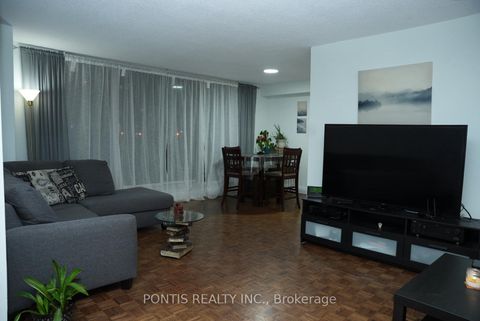 Photo 1 at 408 - 100 PRUDENTIAL Drive, Dorset Park, Toronto