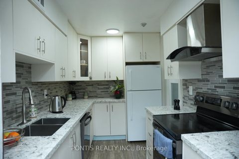 Photo 5 at 408 - 100 PRUDENTIAL Drive, Dorset Park, Toronto