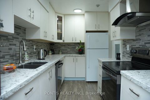 Photo 7 at 408 - 100 PRUDENTIAL Drive, Dorset Park, Toronto