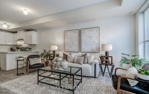 Photo 1 at 61 - 300 Alex Gardner Circle, Aurora Village, Aurora