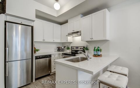 Photo 11 at 61 - 300 Alex Gardner Circle, Aurora Village, Aurora