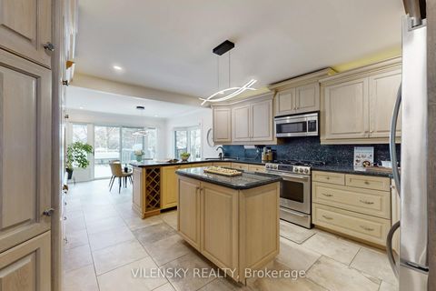 Photo 3 at 32 Whitfield Court, Aurora Highlands, Aurora