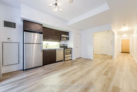 Photo 5 at 302 - 38 Joe Shuster Way, South Parkdale, Toronto