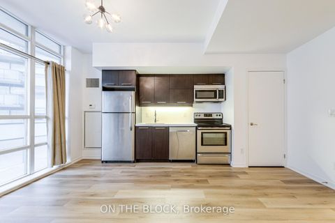 Photo 9 at 302 - 38 Joe Shuster Way, South Parkdale, Toronto