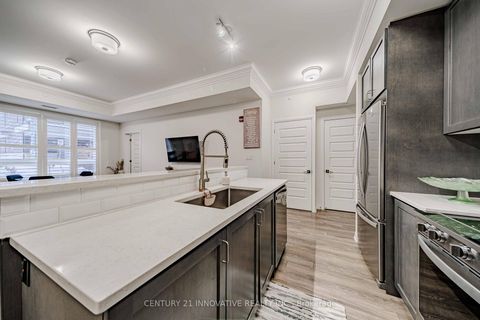 Photo 8 at 103 - 58 Adam Sellers Street, Cornell, Markham