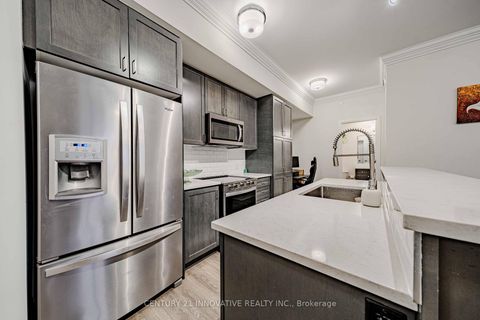 Photo 9 at 103 - 58 Adam Sellers Street, Cornell, Markham