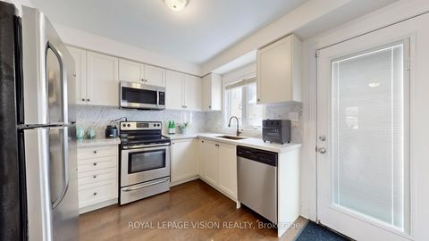 Photo 10 at 32 Zezel Way, Dorset Park, Toronto