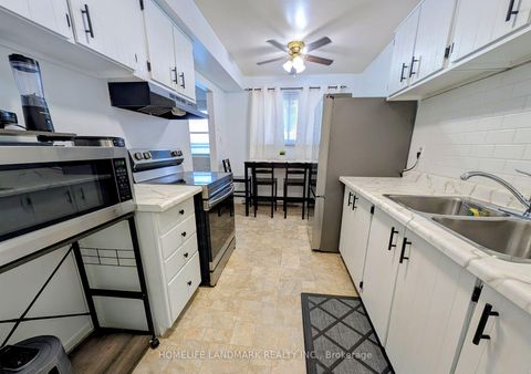 Photo 6 at 15 - 120 Nonquon Road, Centennial, Oshawa