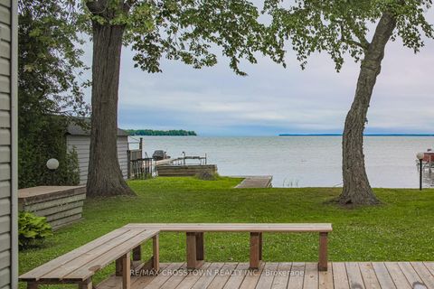 Photo 1 at 128 Moores Beach Road, Virginia, Georgina