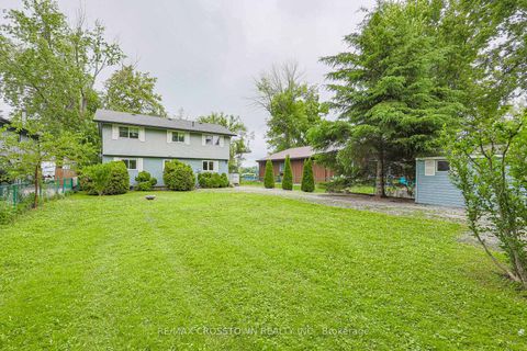 Photo 3 at 128 Moores Beach Road, Virginia, Georgina