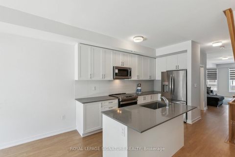 Photo 13 at 65 Akil Thomas Gardens, Bendale, Toronto