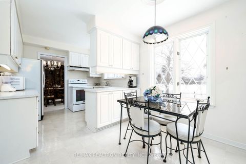 Photo 11 at 9 Eastlea Crescent, L'Amoreaux, Toronto