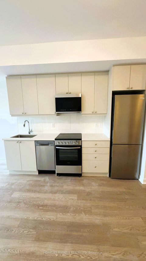 Photo 5 at 404 - 55 Clarington Boulevard, Bowmanville, Clarington