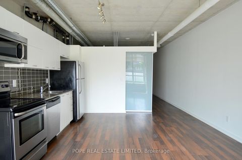 Photo 10 at 312 - 38 Joe Shuster Way, South Parkdale, Toronto