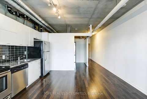 Photo 11 at 312 - 38 Joe Shuster Way, South Parkdale, Toronto