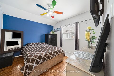 Photo 10 at 61 Bloomington Crescent, Black Creek, Toronto