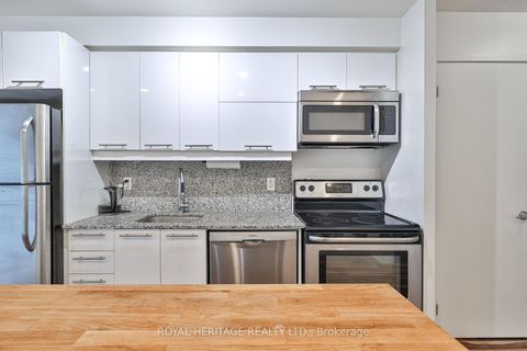 Photo 8 at 104 - 38 Joe Shuster Way, South Parkdale, Toronto