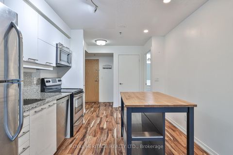 Photo 10 at 104 - 38 Joe Shuster Way, South Parkdale, Toronto