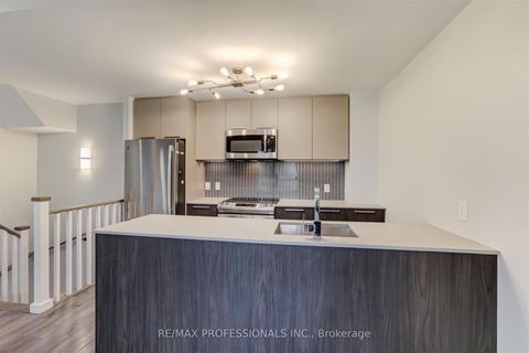 Photo 10 at TH3 - 10 Brin Drive, Humber Valley, Toronto