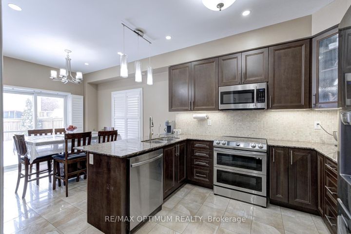 Photo 17 at 9 Ballyhaise Crescent, Credit Valley, Brampton